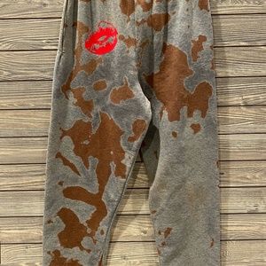 Jogger sweatpants size small with red lips on back